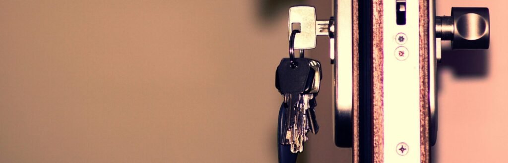 Detailed view of a door lock and keys emphasizing security and access.